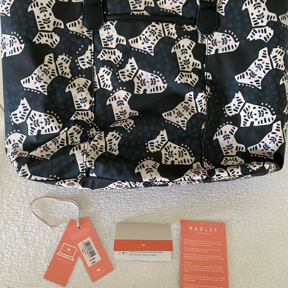 Radley London Large Zip-Top Tote Bag with laptop sleeve in navy print. - Picture 9 of 9